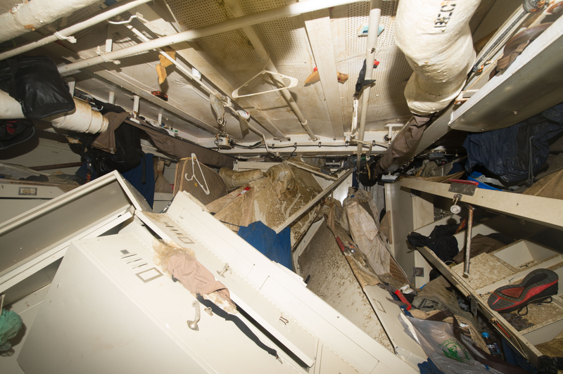 Berthing 2 with the lockers and destroyed racks. Water filled this compartment in less than 2 minutes. Image: US Navy